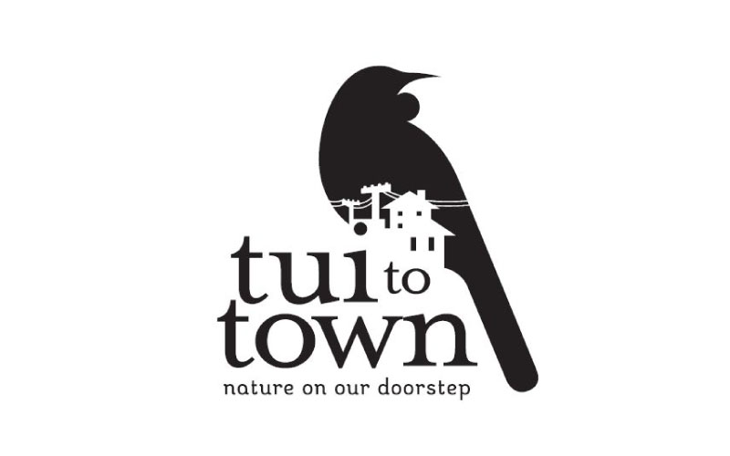 Tui to Town logo. 