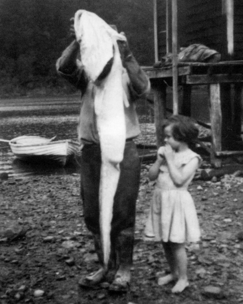 Roy and Sue Archer with a 2 metre Ling at Tuna Bay c1950